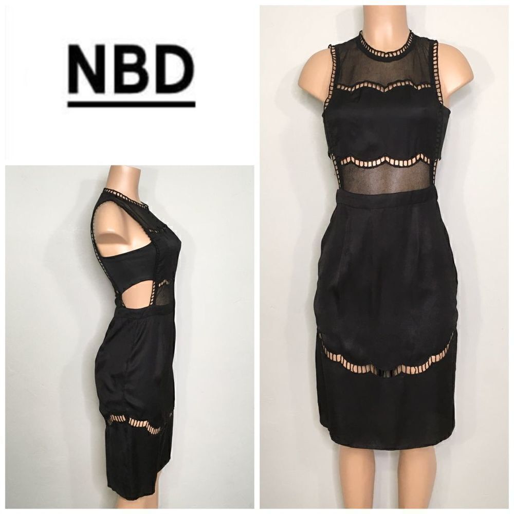 New. NBD black cut out lace trimmed dress.